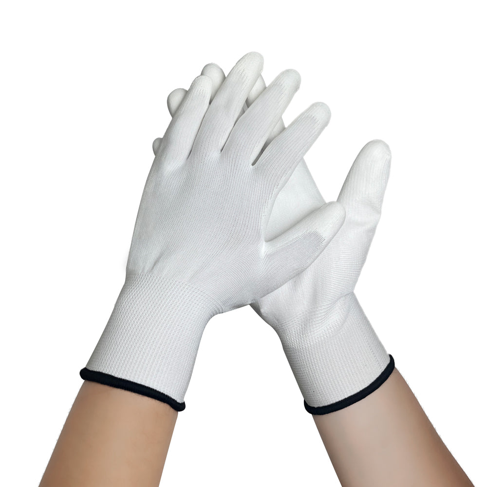 White gloves with black cuffs on a white background